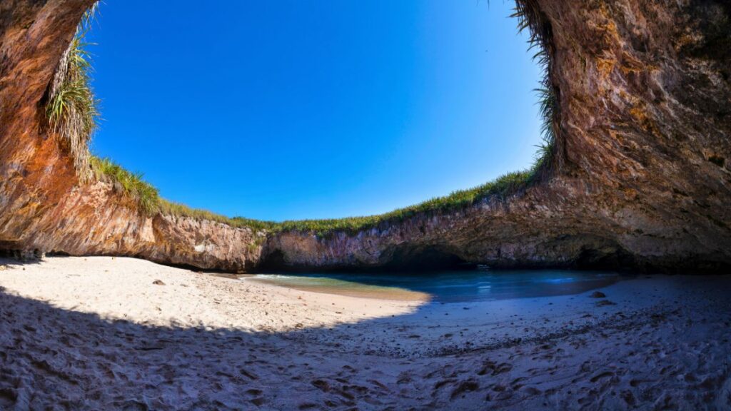 The iconic Hidden Beach or Playa del Amor at Marietas Islands, a famous natural wonder and tourist destination in Mexico.
